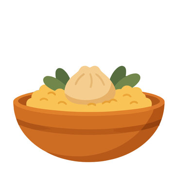 Bowl of yellow food with dumpling and leaves