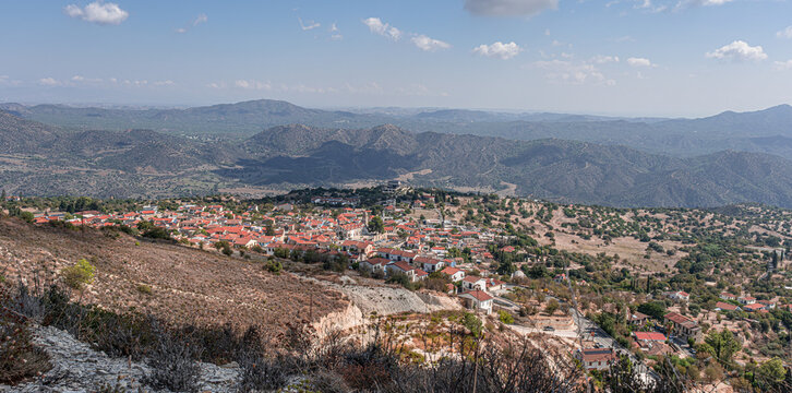 View of Pano Lefkara, a picturesque mountain village, located at the foot of the Troodos Mountains, as seen from Sotiras Hill, the peak rising directly above the village, Larnaca province, Cyprus