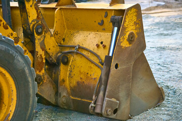 Backhoe of bulldozer grader excavator on the ground © Igor