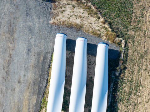 Aerial view of wind turbine blades stored at Windpark Forst Briesnig II on recultivated land of the former Janschwalde open-pit mine in Forst, Brandenburg, Germany.