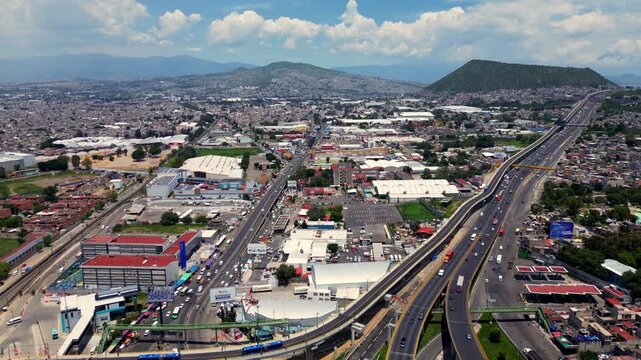 Aerial view of Mexico City highway and urban sprawl