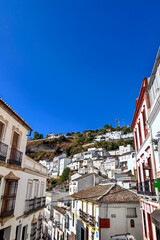 Setenil de las Bodegas is a famous cave house town featuring homes built beneath massive rock overhangs in Cadiz, Andalusia, Spain  © Olga Biliak