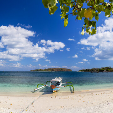 Outrigger boat on beach, Sekotong, Lombok, Indonesia
