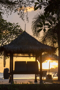 Sunlounger at The Suites Resort at sunset, Sekotong, Lombok, Indonesia