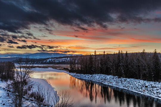 Vivid sunset over the Elk river near Elko, British Columbia, Canada.