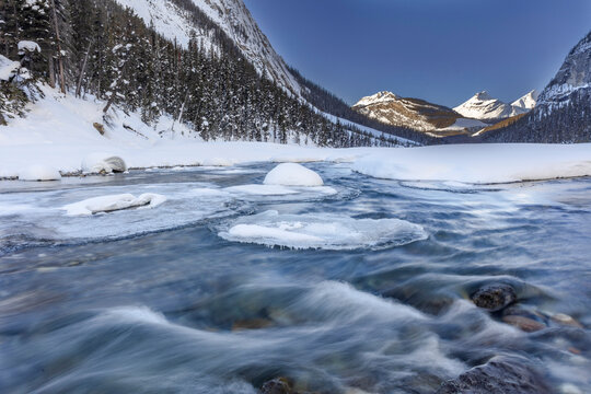 The North Saskatchewan River in winter in Banff National Park, Alberta, Canada.