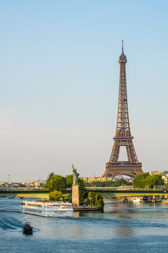 Eiffel Tower and River Seine with cruise boat and Statue of Liberty replica, Paris, France