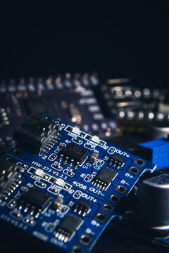 A close-up of a microcontroller; a series of photos on the topic of hardware and embedded systems.