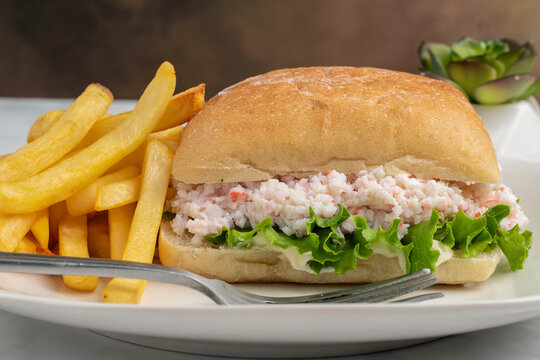 crab salad  sandwich seved with french fries