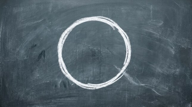 Faded chalk circle on worn dark board surface