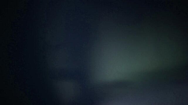 light leak transition with dark and blue tones. This effect adds visual interest to video edits.