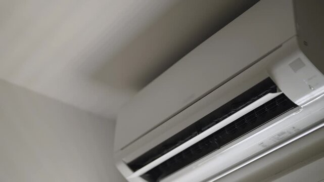 Air conditioner operating with moving vent.