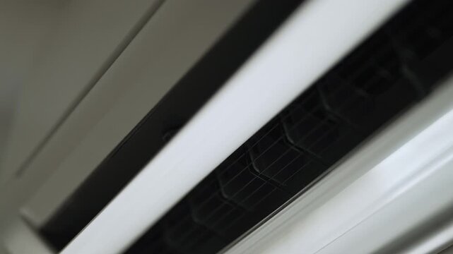Air conditioner operating with moving vent.