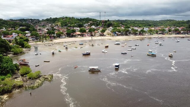 Drone footage aerial view boats on shallow water, Praia da Coroa, Itacare, Bahia state, Brasil