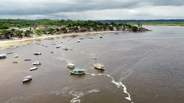 Drone footage aerial view boats on shallow water, Praia da Coroa, Itacare, Bahia state, Brasil