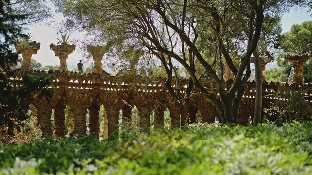 Gaudi Stone Viaduct Arches in Park Guell Barcelona Spain.Filmed on on 15 September 2026.