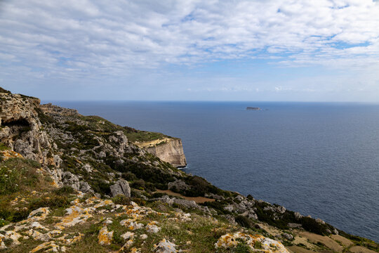 Dingli Cliffs Overlooking the Sea Under a Cloudy Sky
