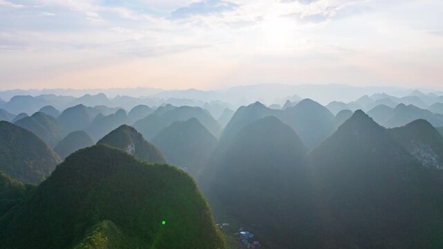 Sunset over the karst mountains of Fengshan County, Hechi City, Guangxi.