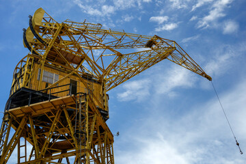 Yellow Industrial Port Crane Against Blue Sky Buenos Aires © Izanbar photos