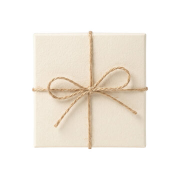 Wrapped gift with natural twine bow on a dark background isolated studio shot