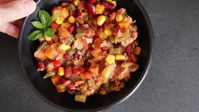 Mexican Fish Salad red beans, corn, green beans, carrots, and bell peppers delicious snack gourmet dish table setting rustic dish top view copy space keto or paleo diets vegetarian food