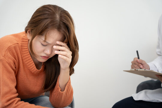 woman with mental health problems is consulting. psychiatrist is recording the patient's condition for treatment. encouragement, love and family problem, bipolar , depression patient, protect suicide