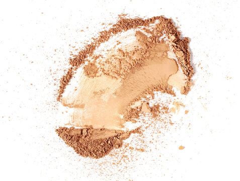Crushed face powder swatch isolated on white background, top view