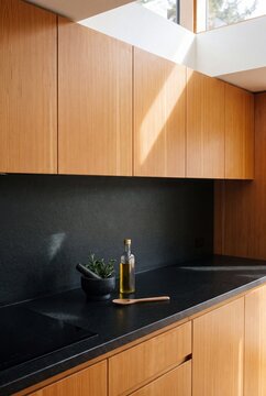 Leathered Black Granite and Vertical Grain Fir Cabinet Detail