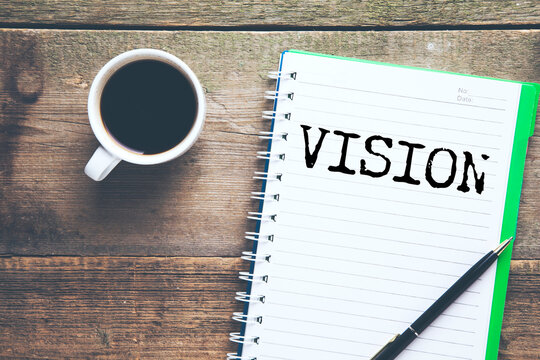 VISION word written on paper