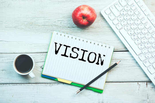 VISION word written on paper