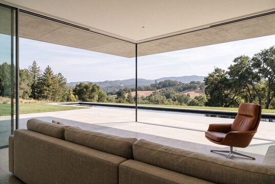 Living Room Looking Through Glass Corner to Lap Pool and Texas Landscape