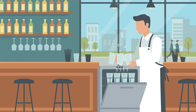 Bartender wearing an apron loads clean glassware into a modern dishwasher behind a wooden bar counter in a cafe.
