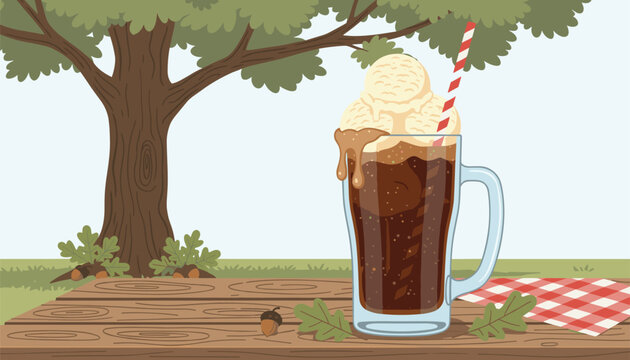 Refreshing root beer float with vanilla ice cream scoops and a red straw sitting on a wooden picnic table.