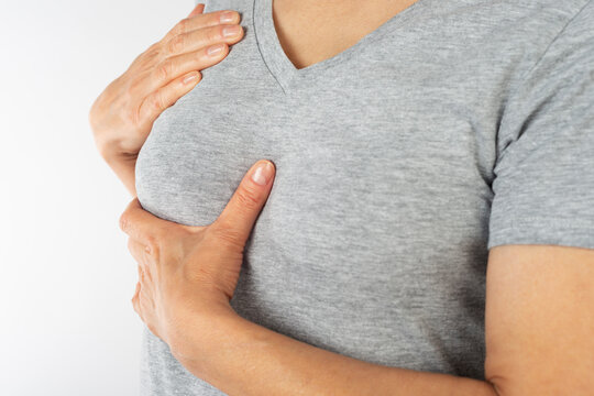 Woman Performing Breast Self-Examination for Health Check