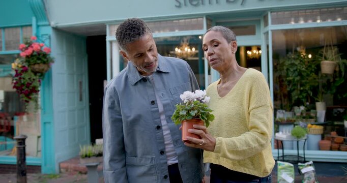 Senior Couple Shopping for Garden Plants Together