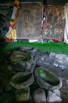 Icon paintings above stone basins, Lalibela, Ethiopia
