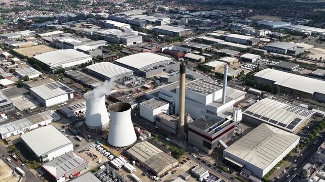 Aerial drone view of Slough industrial estate in the UK, featuring a major cluster of data centers, power infrastructure and facilities supporting AI, cloud computing and digital services.