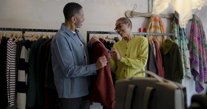 Senior Couple Shopping for Stylish Outerwear Together
