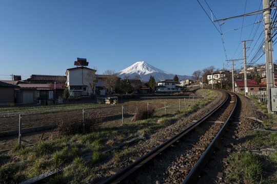 Railroad tracks, back volcano Mt. Fuji, Fujiyoshida, Yamanashi Prefecture, Japan
