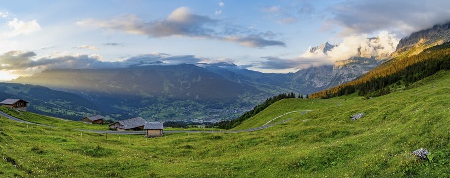Alpine huts and alpine meadows, sunset, summit of the Wetterhorn in the background, Alpiglen, Grindelwald, Bernese Oberland, Switzerland