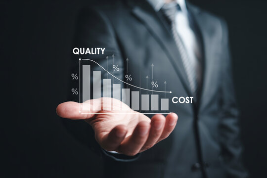 Businessman holding bar chart illustrating quality increase and cost reduction for business optimization.