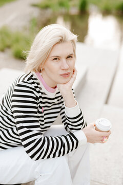 Young beautiful woman person are happy and enjoy with coffee drink in the morning at park