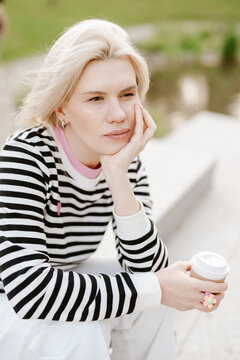 Young beautiful woman person are happy and enjoy with coffee drink in the morning at park