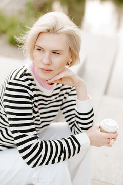 Young beautiful woman person are happy and enjoy with coffee drink in the morning at park