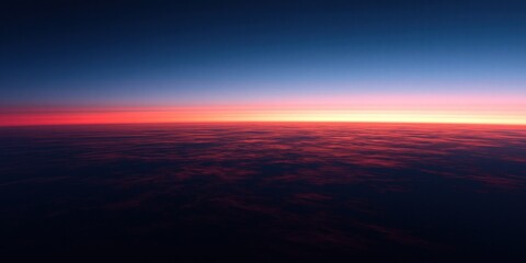 Obraz premium Vast Horizon Above Clouds at Dusk with Fiery Red and Deep Blue Sky