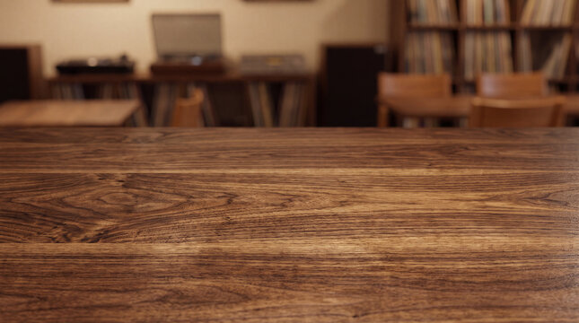 Vintage wooden table surface with blurred room interior