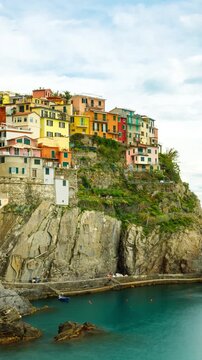 Vertical Time Lapse of the beautiful and scenic seaside village of Manarola in Italy. One of the small towns that makes up Cinque Terre.