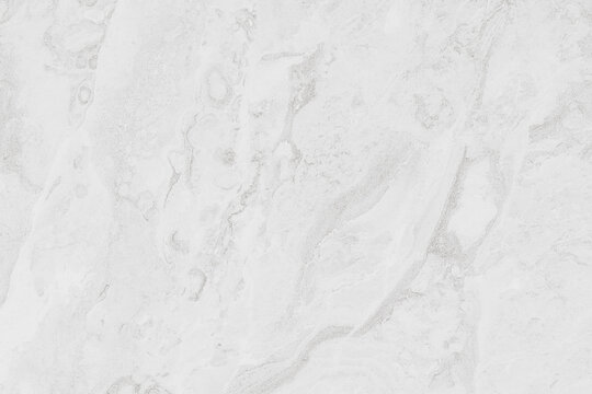 Horizontal background of white and light gray marble texture surface with natural subtle veins and copy space for text