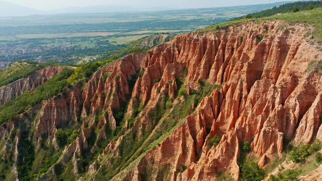 Aerial view of Stob earth pyramids rock formations near Rila monastery in Bulgaria on sunny day