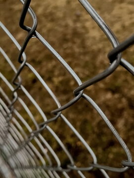 Metal chain link fence close up